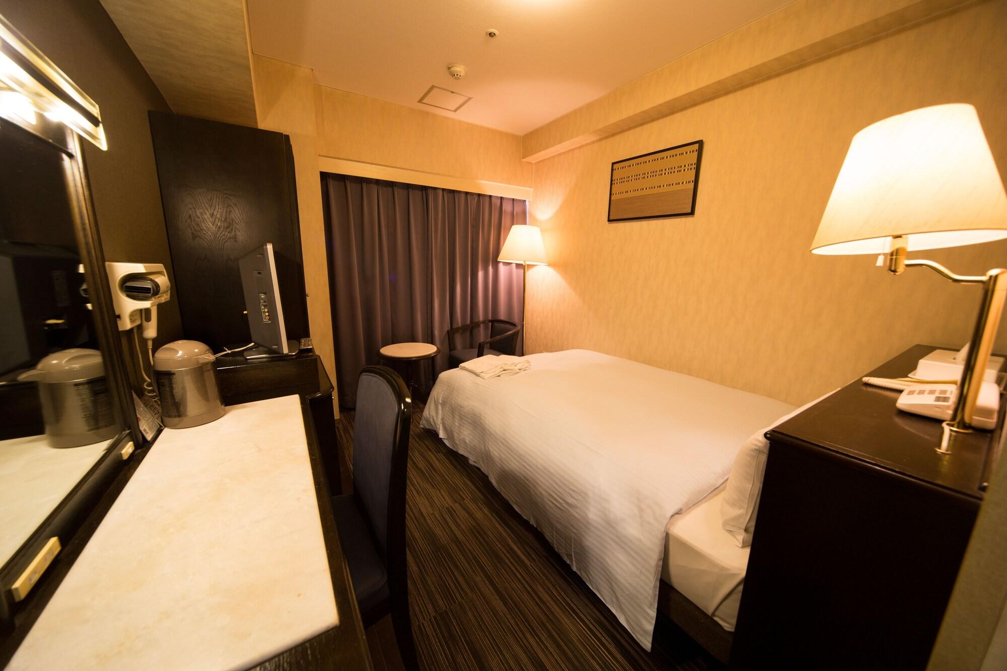 Hotel Claiton Esaka Suita Extérieur photo