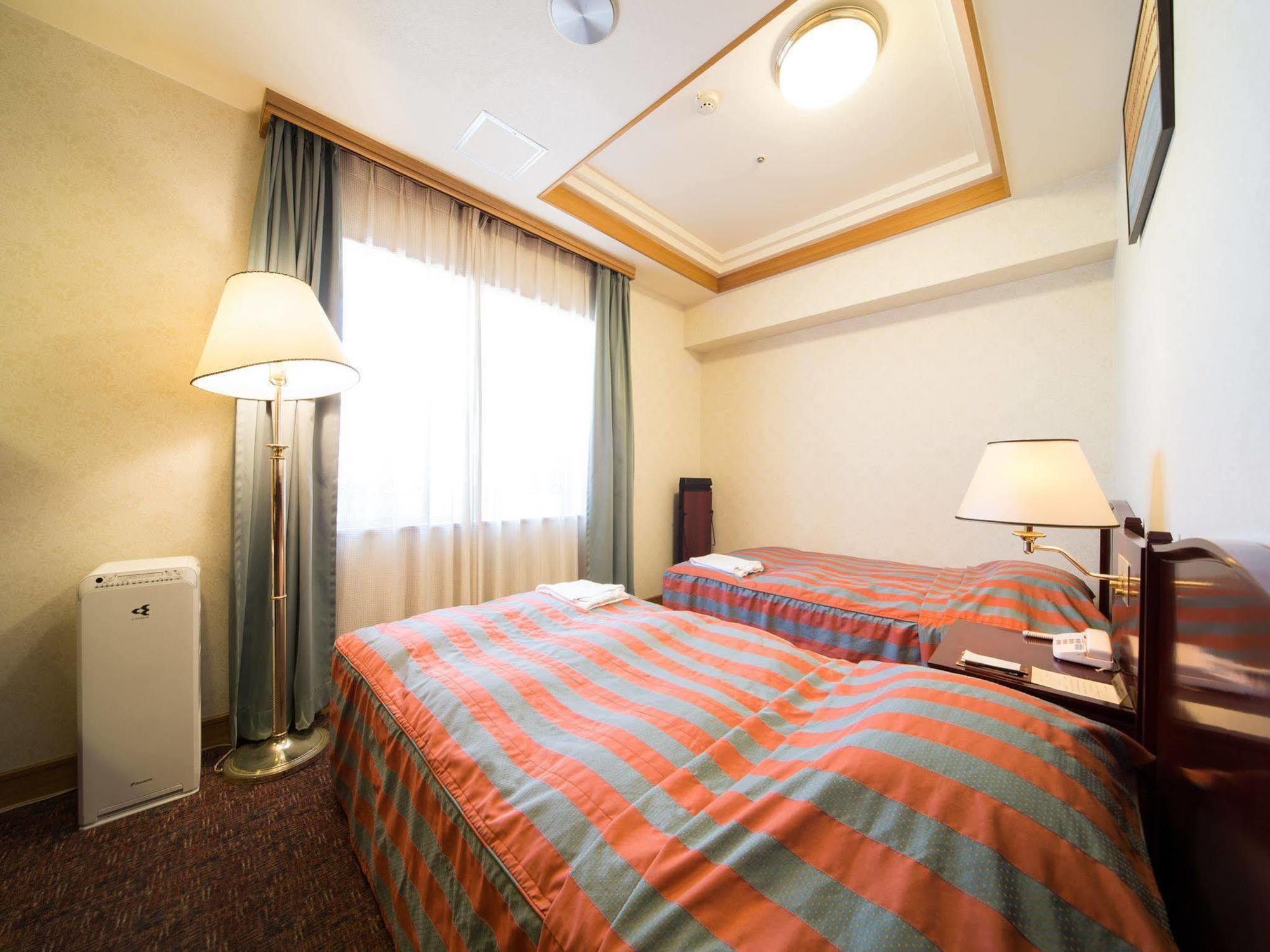 Hotel Claiton Esaka Suita Extérieur photo